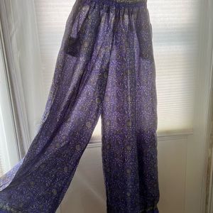 Wide legged pants with silky feel.